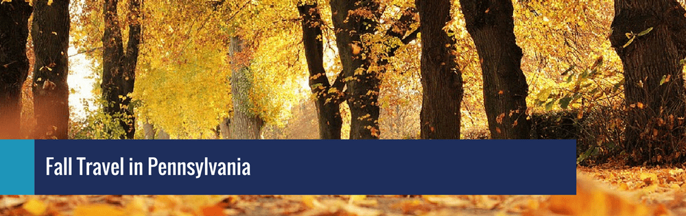 Fall travel in Pennsylvania title over a photo of yellow fall leaves